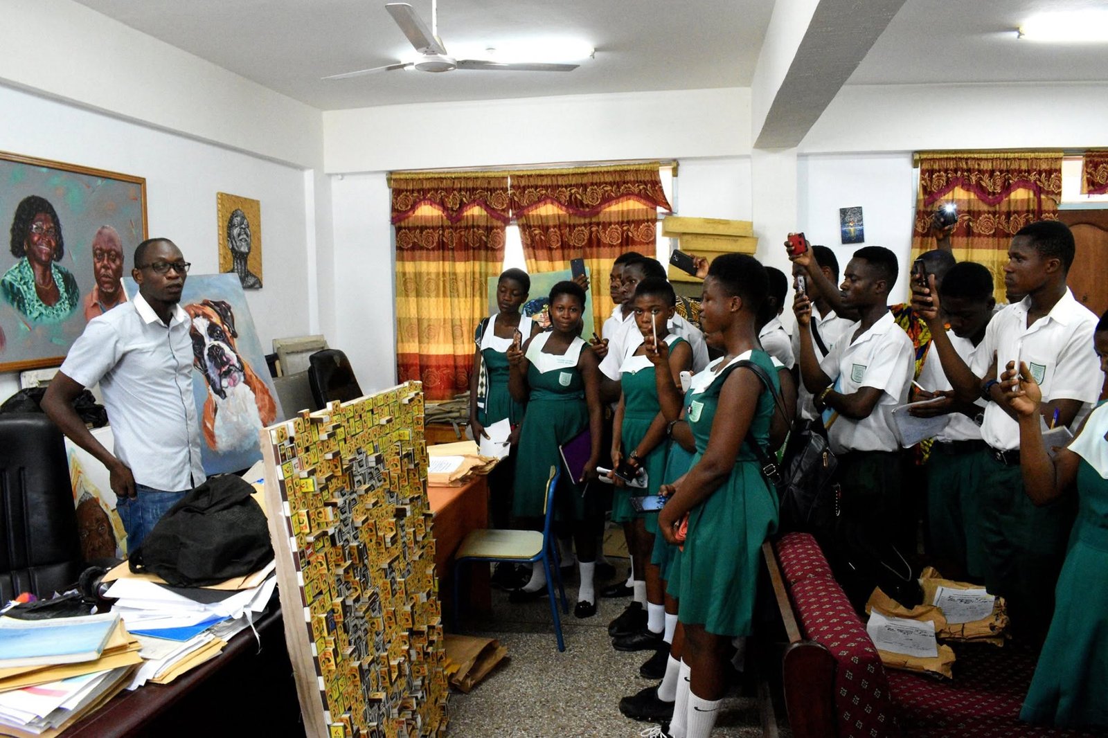 Visitors viewing graphic design work during a department exhibition